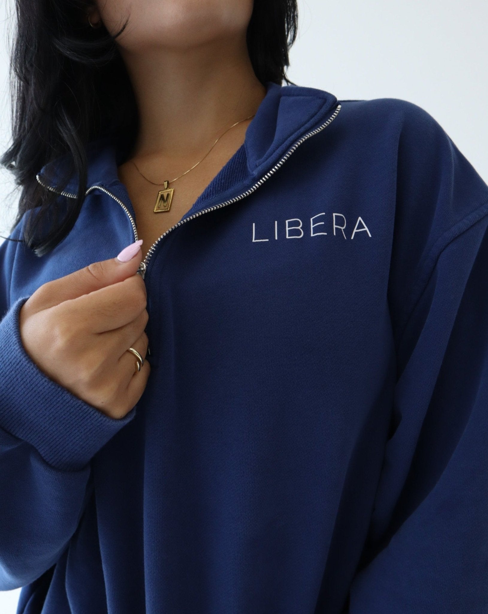REFINE Quarter-Zip Sweater - NAVY - LIBERA Fitness Apparel. Upgrade your wardrobe with our REFINE Quarter-Zip Sweater. Trendy design for all-day comfort.